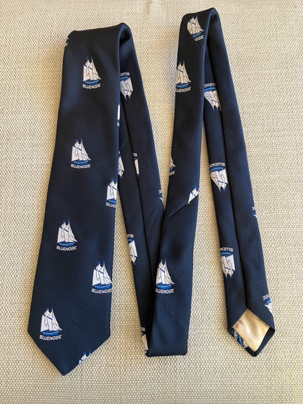 Vintage men’s tie “Bluenose” schooner sailing ship motif navy blue & white